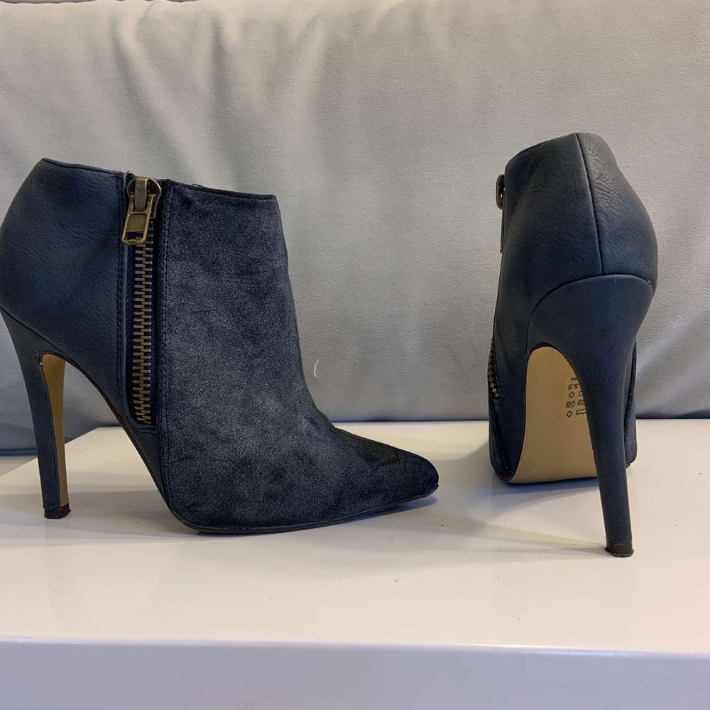 Beautiful blue suede heeled boot.